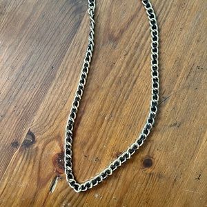 Gold and black chain.